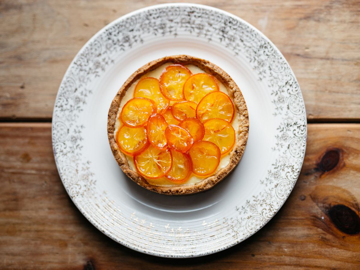 A tart topped with thinly sliced, candied oranges.