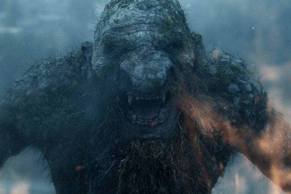 A facial close-up of the rocky, bulbous-nosed, 50-meter-tall troll in Troll, roaring at the screen