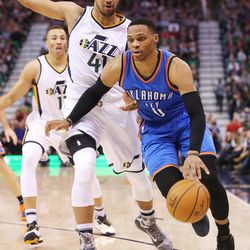 Utah Jazz forward Trey Lyles (41) works to stay with Oklahoma City Thunder guard Russell Westbrook (0) as the Jazz and the Thunder play at Vivint Smart Home arena in Salt Lake City on Wednesday, Dec. 14, 2016.