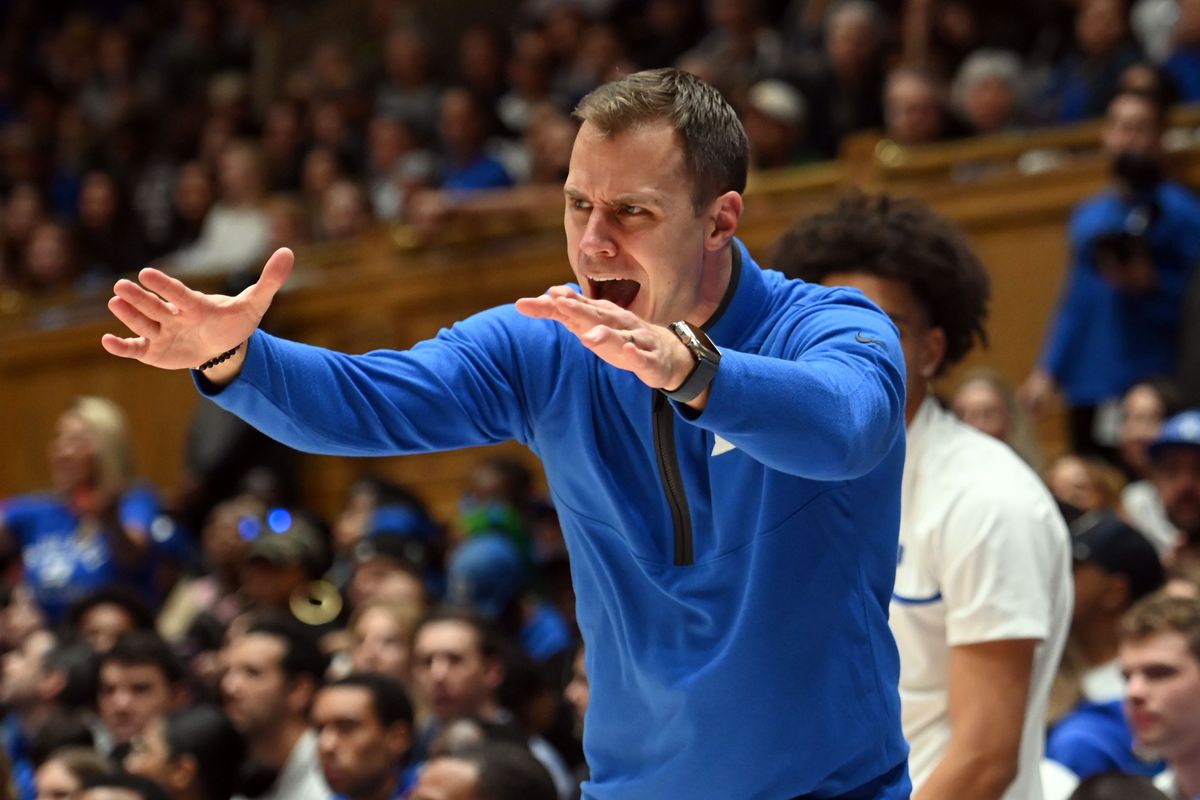 Dec 9, 2023; Durham, North Carolina, USA; Duke Blue Devils head coach Jon Scheyer reacts to a call during the second half against the Charlotte 49ers at Cameron Indoor Stadium.