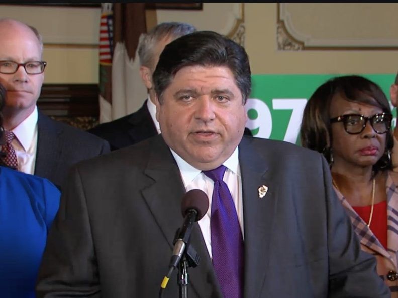 Gov. J.B. Pritzker speaks at a news conference on Tuesday in Springfield. Screen image.