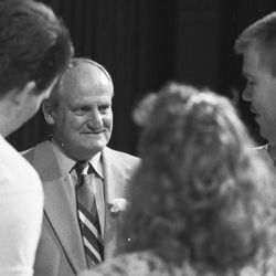 BYU head football coach LaVell Edwards speaks at Cottonwood High School in January 1990.