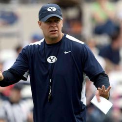 Coach Bronco Mendenhall talks to the team during the BYU spring scrimmage at the LaVell Edwards Stadium in Provo on Saturday, March 24, 2012. 
