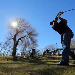 Patric Green gets in some time at Bonneville Golf Course in Salt Lake City as warm temperatures Sunday, Feb. 8, 2015, allow numerous activities from skiing and snowboarding, to golfing, biking and hiking along the Wasatch Front.