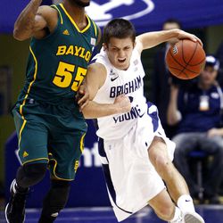 BYU's #2 Craig Cusick ,right, is pressured by Baylor's #55 Pierre Jackson on a push up court as BYU and Baylor play Saturday, Dec. 17, 2011 in the Marriott Center in Provo. Baylor won 86-83.