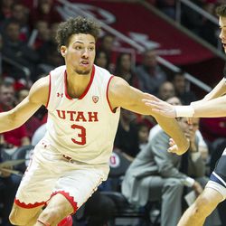 Utah guard Devon Daniels (3) drives to the hoop against Butler guard Sean McDermott (22) during an NCAA college basketball game at the Huntsman Center in Salt Lake City on Monday, Nov. 28, 2016. Butler took down Utah 68-59 to remain undefeated.