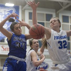 Bingham's Jada Suguturaga (32), Fremont's Haylee Doxey (32) and Emma Calvert (25) go for the ball during Fremont's 61-47 victory against Bingham in the Class 6A state championship game at Salt Lake Community College in Taylorsville on Saturday, Feb. 24, 2018.