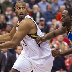 Utah center Boris Diaw (33) looks to drive against Golden State forward Draymond Green (23) during the first half of an NBA basketball game in Salt Lake City on Thursday, Dec. 8, 2016.