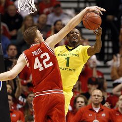 Utah Utes forward Jakob Poeltl (42) blocked a shot by Oregon Ducks forward Jordan Bell (1) during the first half of the Pac-12 conference tournament championship game at the MGM Grand Garden Arena in Las Vegas, Saturday, March 12, 2016.