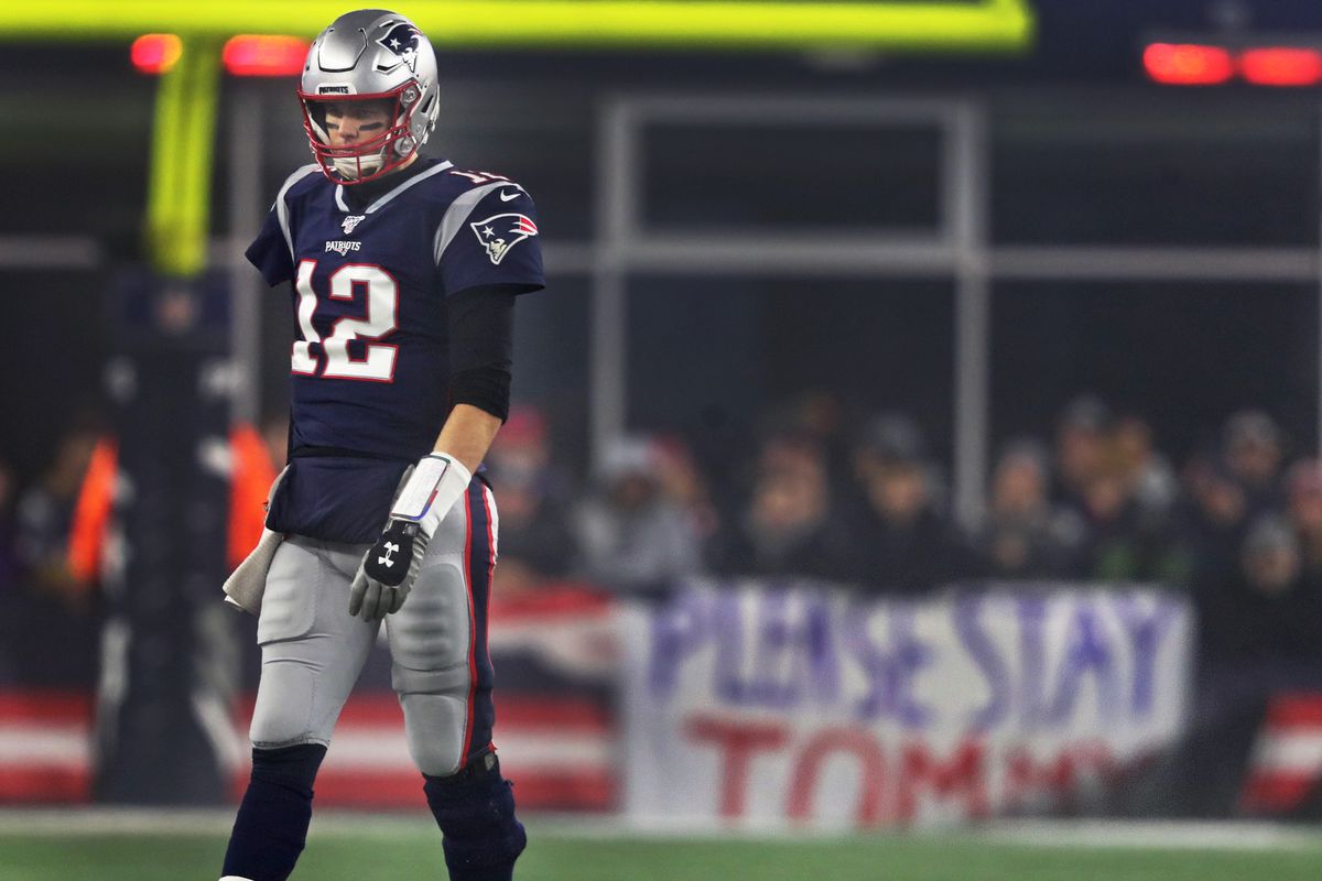 A sign in the south end zone reads “Please Stay Tommy” in reference to the impending free agency of New England Patriots quarterback Tom Brady. The New England Patriots host the Tennessee Titans in the Wild Card AFC Division game at Gillette Stadium in Foxborough, MA on Jan. 4, 2020.