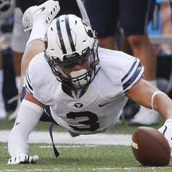 Brigham Young Cougars wide receiver Colby Pearson (3) dives on a ball against Nebraska in Lincoln Saturday, Sept. 5, 2015. BYU won 33-28 on a last-second touchdown pass. 