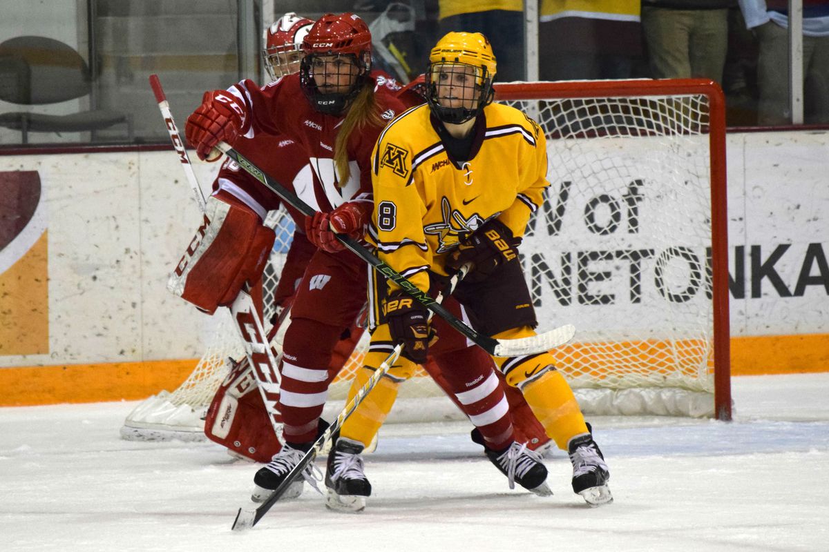 Wisconsin's Mellissa Channell and Minnesota's Amanda Kessel fight for real estate in front of the Badgers' goal.