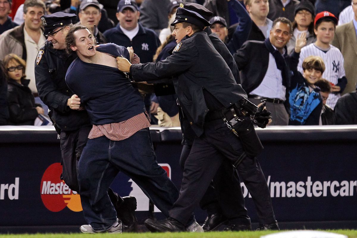 This disturbed man is an A-Rod stalker. Most Yankees thing about the photo is a kid smiling/waving.