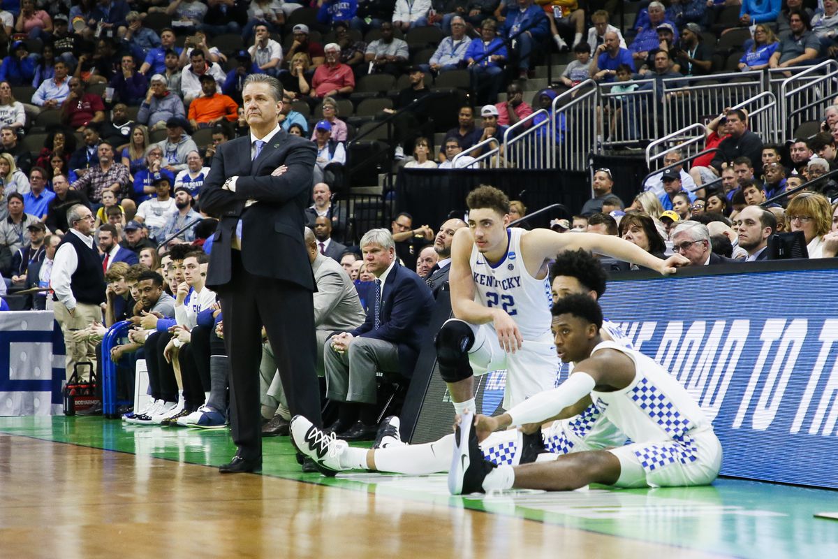 Kentucky Wildcats head coach John Calipari looks on from the bench during a game against the Abilene Christian Wildcats in the first round of the 2019 NCAA Photos via Getty Images Men’s Basketball Tournament held at VyStar Veterans Memorial Arena on March 21, 2019 in Jacksonville, Florida.