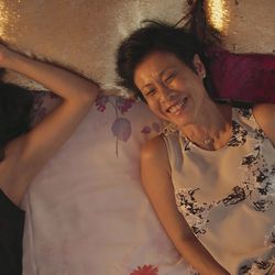 (L-R) CONSTANCE WU as Rachel and TAN KHENG HUA as Kerry in Warner Bros. Pictures', SK Global Entertainment's and Starlight Culture's contemporary romantic comedy “Crazy Rich Asians.”