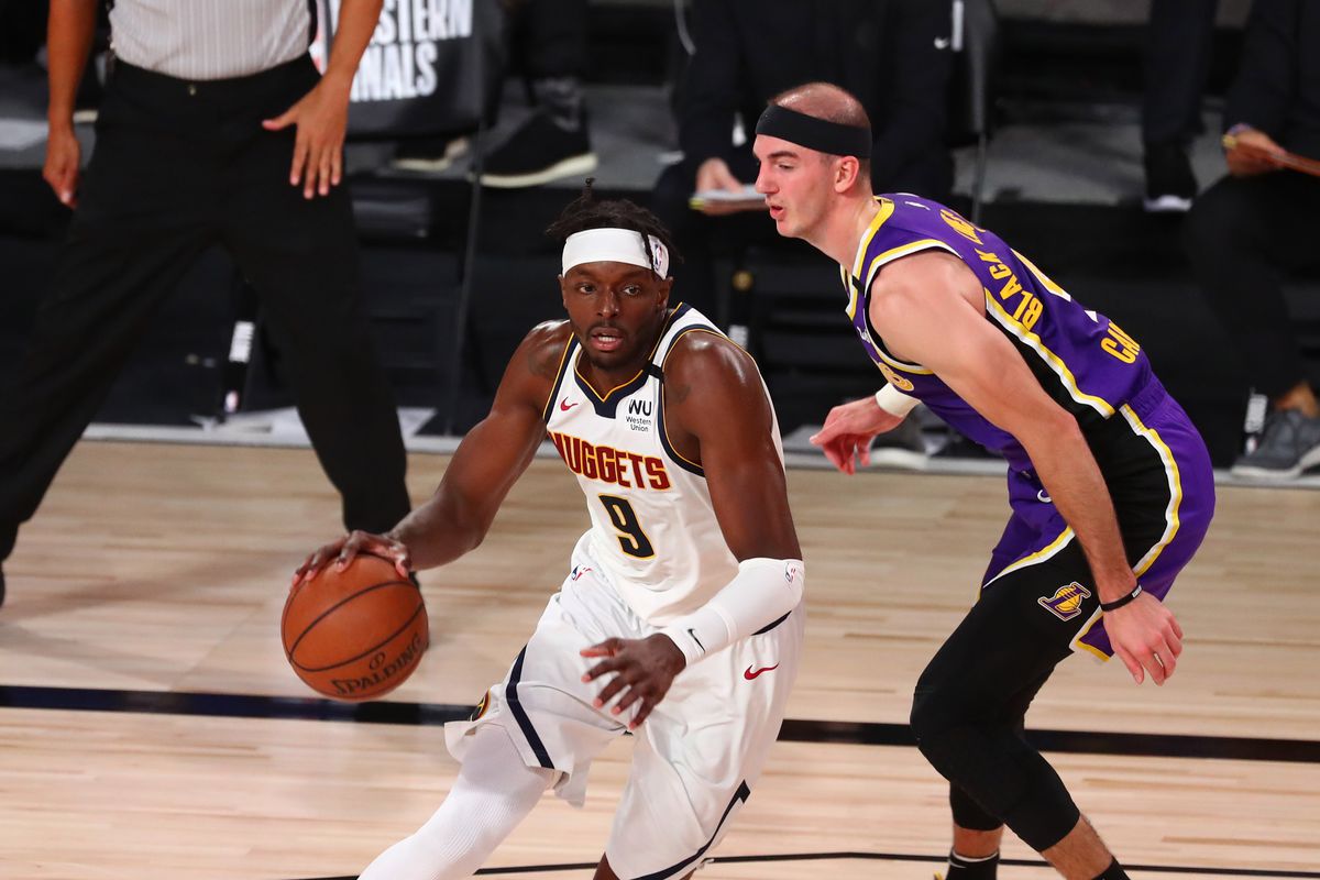 Denver Nuggets forward Jerami Grant drives past Los Angeles Lakers guard Alex Caruso during the first half in game five of the Western Conference Finals of the 2020 NBA Playoffs at AdventHealth Arena.&nbsp;