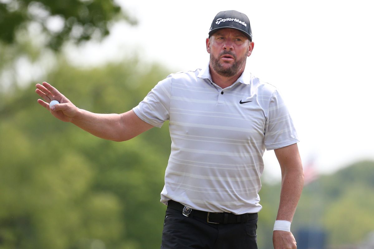 Michael Block waves to fans after his par putt on the 4th hole during the final round at the PGA Championship at Oak Hill Country Club Sunday, May 21, 2023.