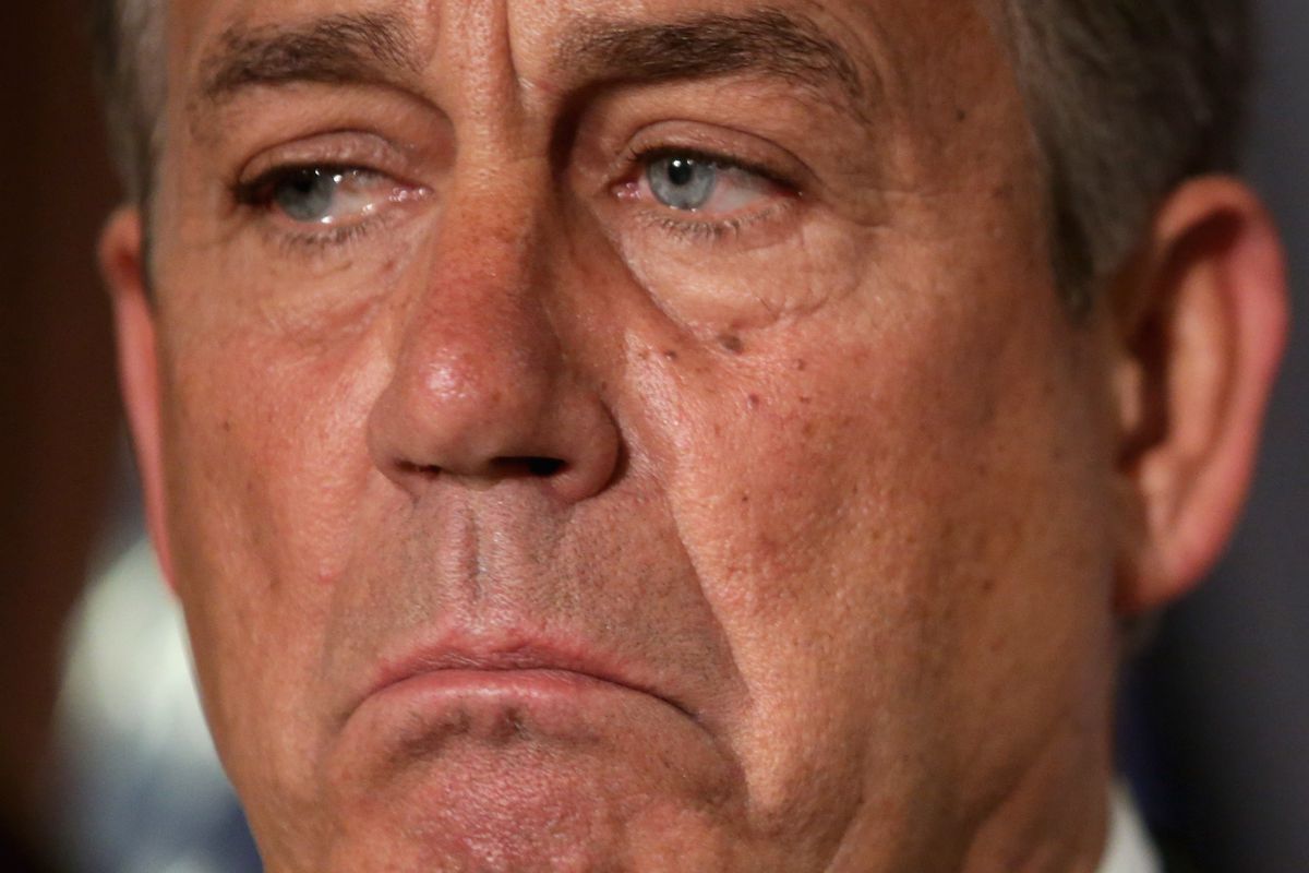 House Speaker John Boehner (R-OH) will stay in power until Republicans are able to choose a successor. And he's not happy about it. (Chip Somodevilla/Getty Images)