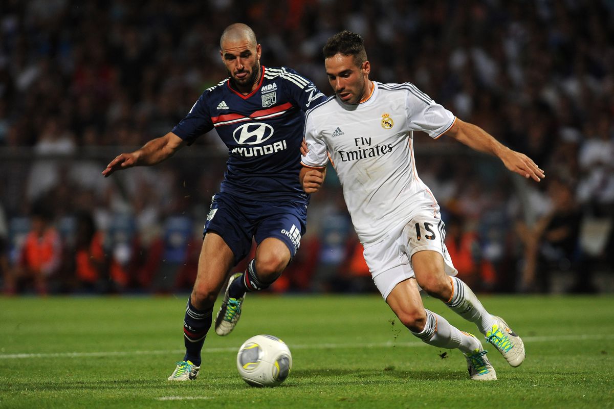 Dani Carvajal battles with Lyon's Lisandro Lopéz in Wednesday's 2-2 draw