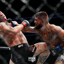 Mike Perry and Paul Felder battle at UFC 226.