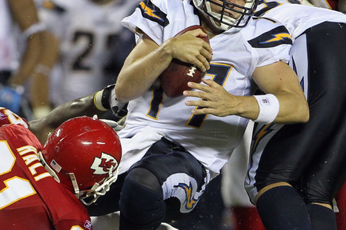 KANSAS CITY MO - SEPTEMBER 13:  Quarterback Philip Rivers #17 of the San Diego Chargers is sacked during the game against the Kansas City Chiefs on September 13 2010 at Arrowhead Stadium in Kansas City Missouri.  (Photo by Jamie Squire/Getty Images)