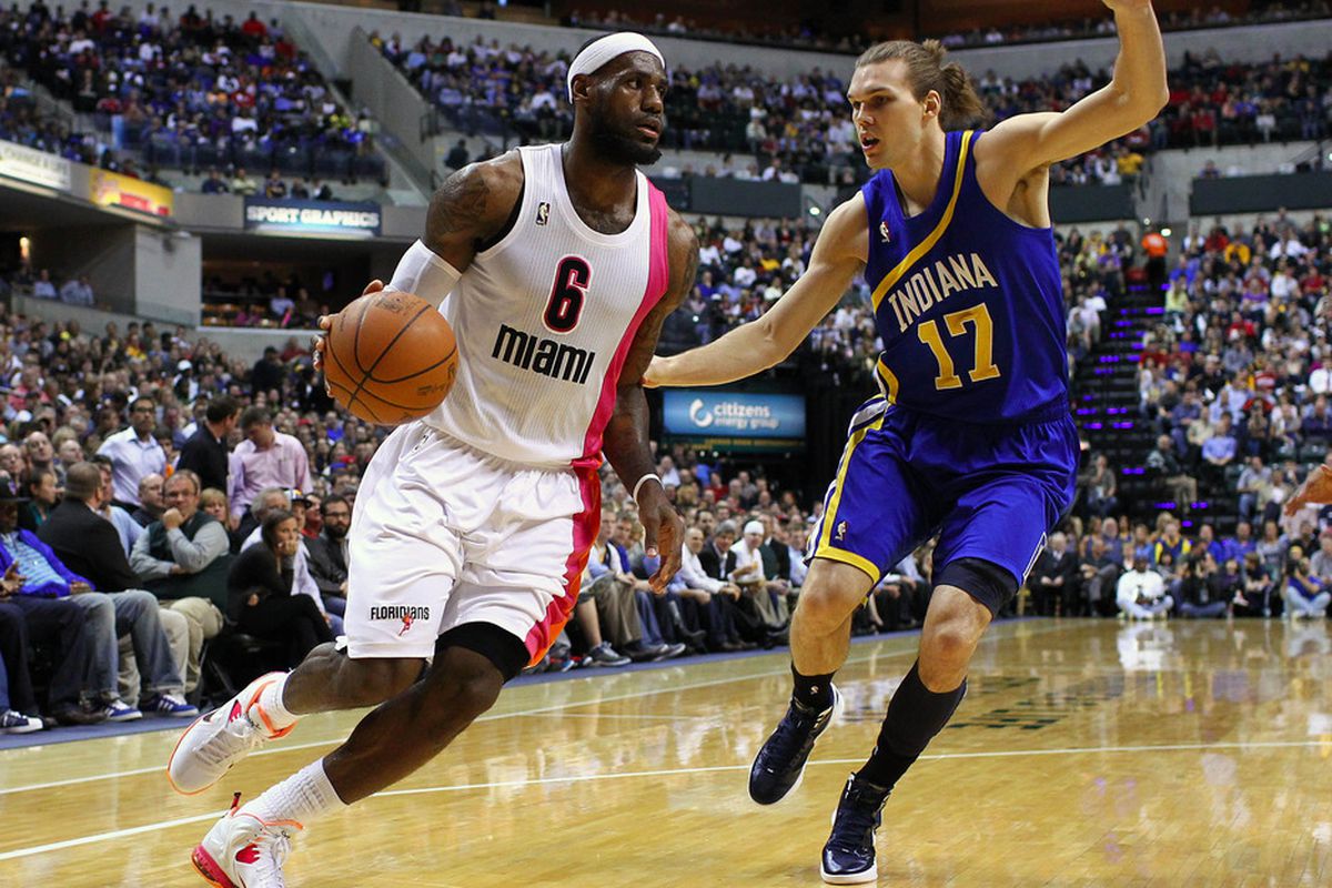 March 26, 2012; Indianapolis, IN, USA; Miami Heat small forward LeBron James (6) dribbles against Indiana Pacers center Louis Amundson (17) at Bankers Life Fieldhouse. Indiana defeated Miami 105-90. Mandatory credit: Michael Hickey-US PRESSWIRE