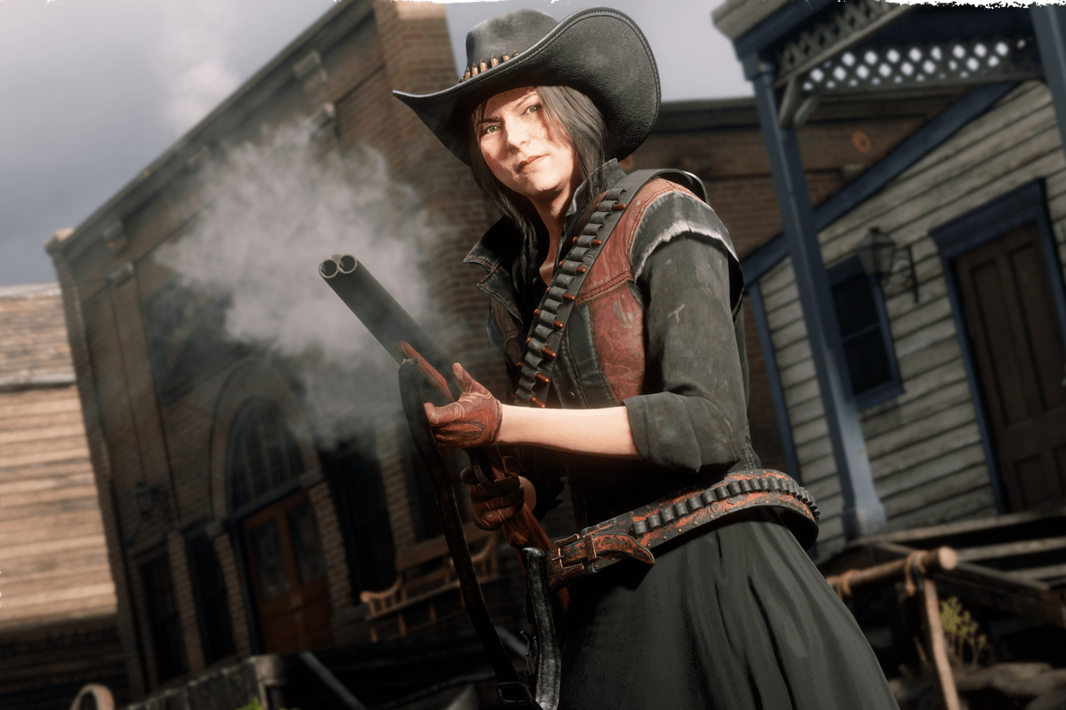 Red Dead Online - a young woman clutches a smoking shotgun. She’s dressed in red and black, with a cowboy hat and skirts on, and has black hair. She looks determined.