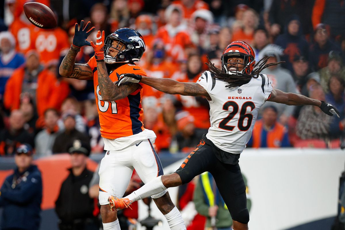 Denver Broncos wide receiver Tim Patrick (81) makes a catch for a touchdown ahead of Cincinnati Bengals cornerback Trae Waynes (26) in the third quarter at Empower Field at Mile High.&nbsp;