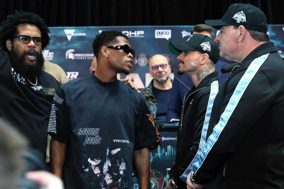 Devin Haney (L) and George Kambosos Jnr (R) face-off during the press conference ahead of the World Lightweight Undisputed Championship fight, at Rod Laver Arena on October 14, 2022 in Melbourne, Australia.