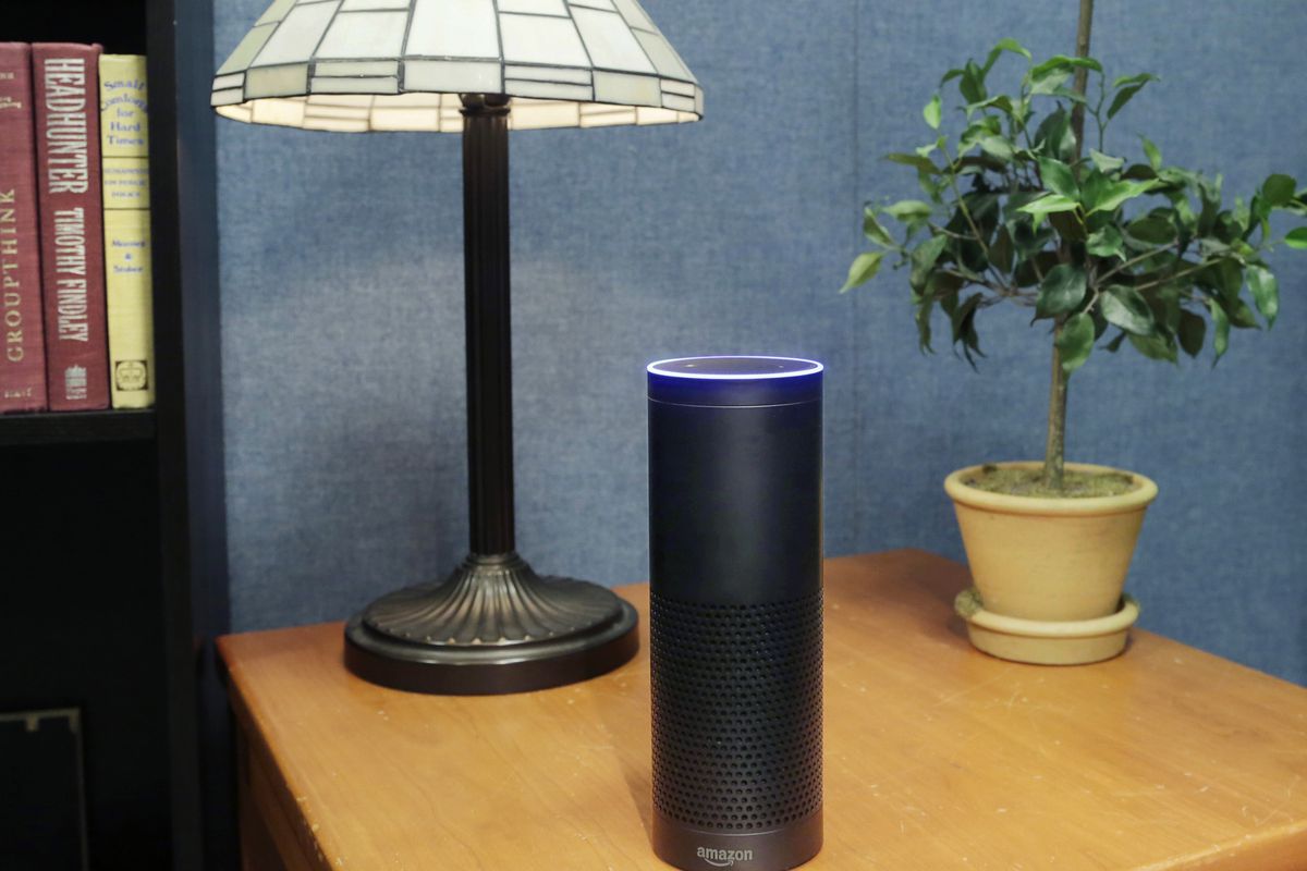 This July 29, 2015 file photo made in New York shows Amazon's Echo, a digital assistant that continually listens for commands such as for a song, a sports score or the weather. The company says Echo transmits nothing to Amazons data centers until you firs