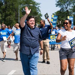 JB Pritzker and Juliana Stratton walk in the Bud Billiken Day Parade on August 11, 2018. | Max Herman/For the Sun-Times