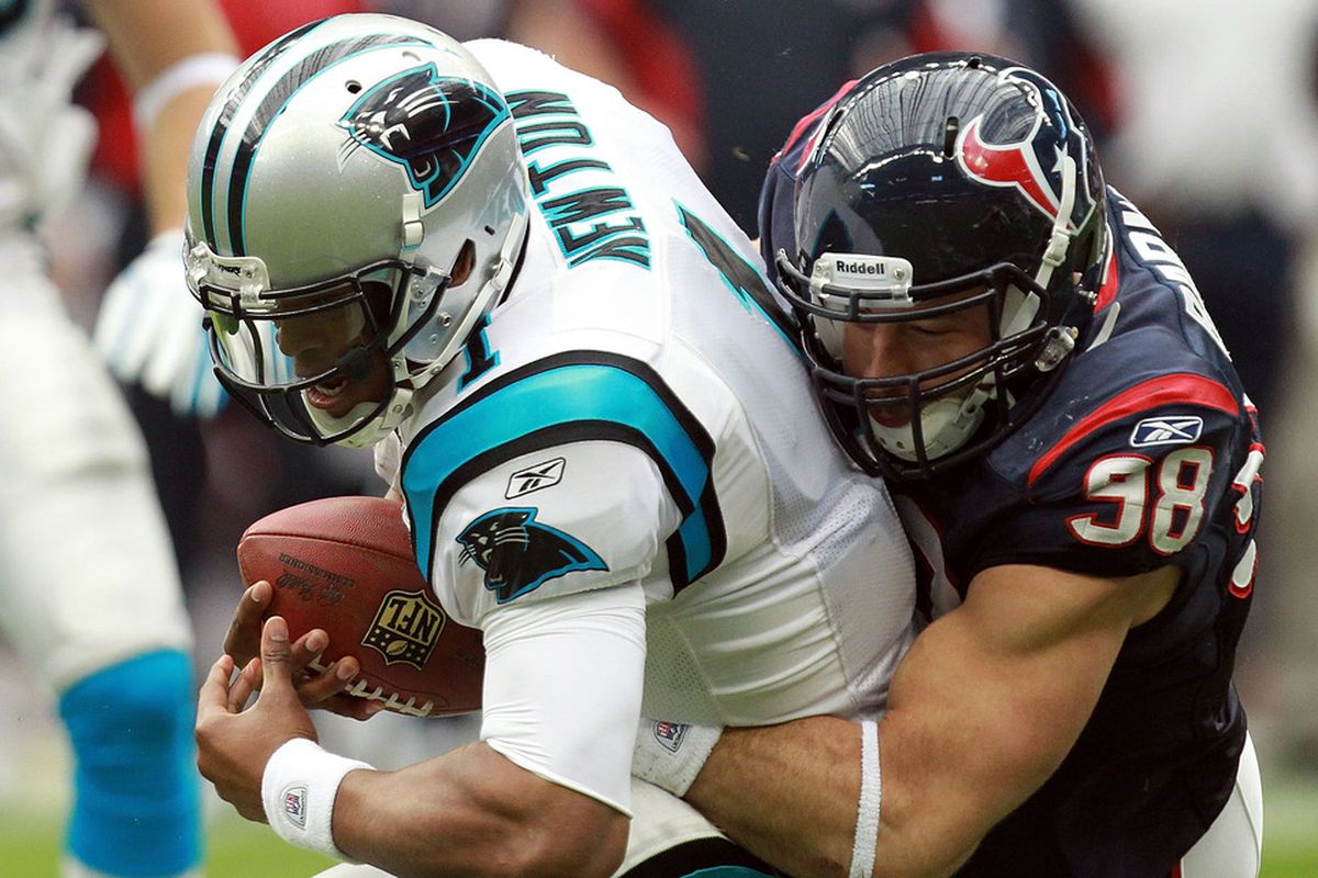 HOUSTON, TX - DECEMBER 18:   Cam Newton #1 of the Carolina Panthers is sacked by  Connor Barwin #98 of the Houston Texans at Reliant Stadium on December 18, 2011 in Houston, Texas.  (Photo by Ronald Martinez/Getty Images)