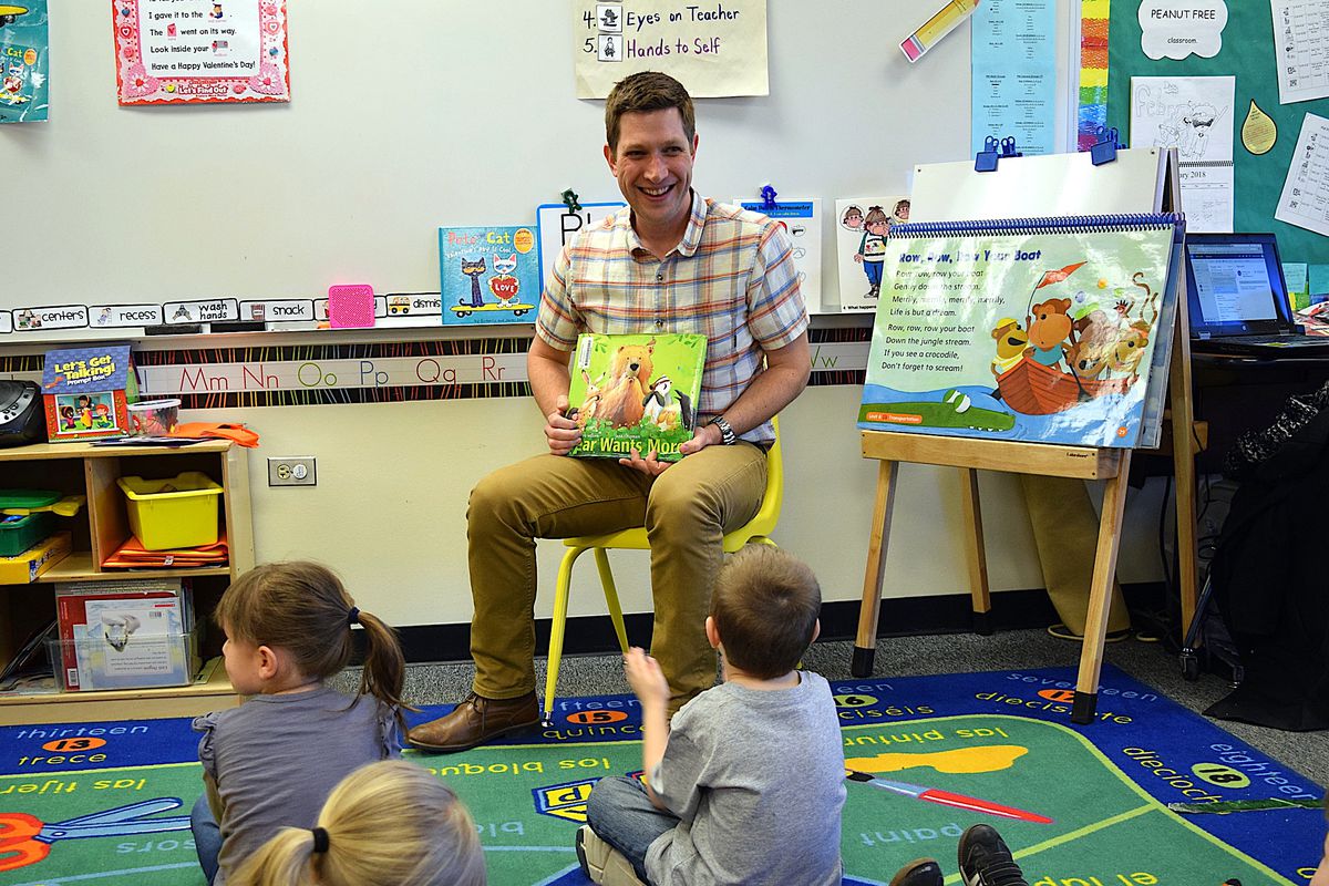 Dan Haught, a speech-language pathologist at Mesa Elementary School in Westminster Public Schools, with children in a preschool classroom.