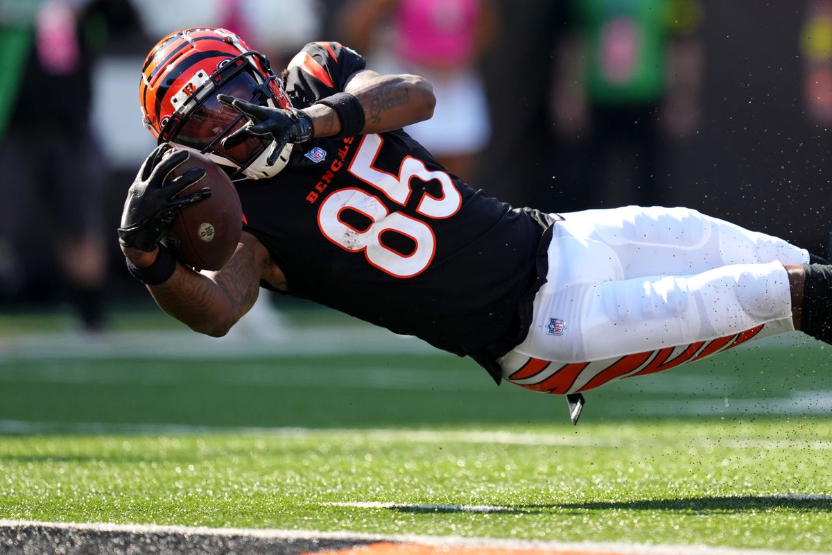 Cincinnati Bengals wide receiver Tee Higgins (85) stretches for the end zone in the fourth quarter during a Week 7 NFL game against the Atlanta Falcons, Sunday, Oct. 23, 2022, at Paycor Stadium in Cincinnati.