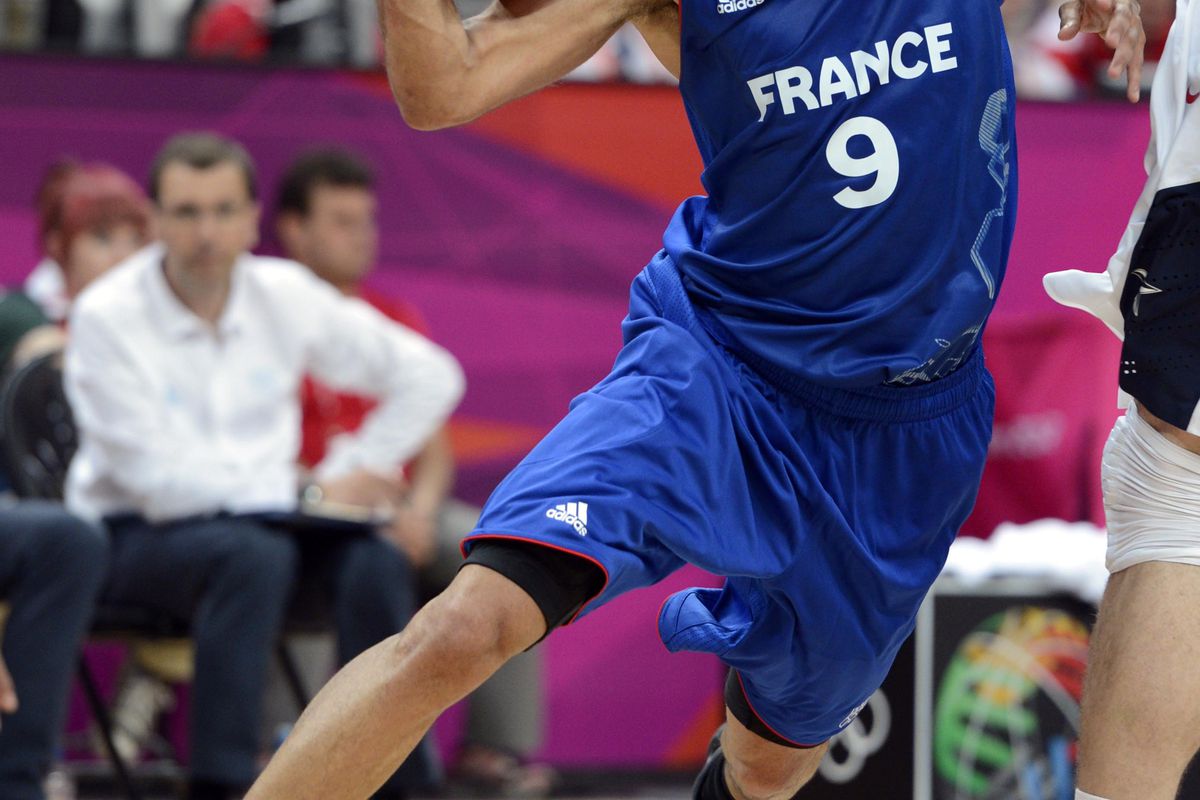 Jul 29, 2012; London, United Kingdom; France guard Tony Parker (9) drives to the basket against USA during the men's basketball preliminary during the 2012 London Olympic Games at the Basketball Arena. Mandatory Credit: Bob Donnan-USA TODAY Sports