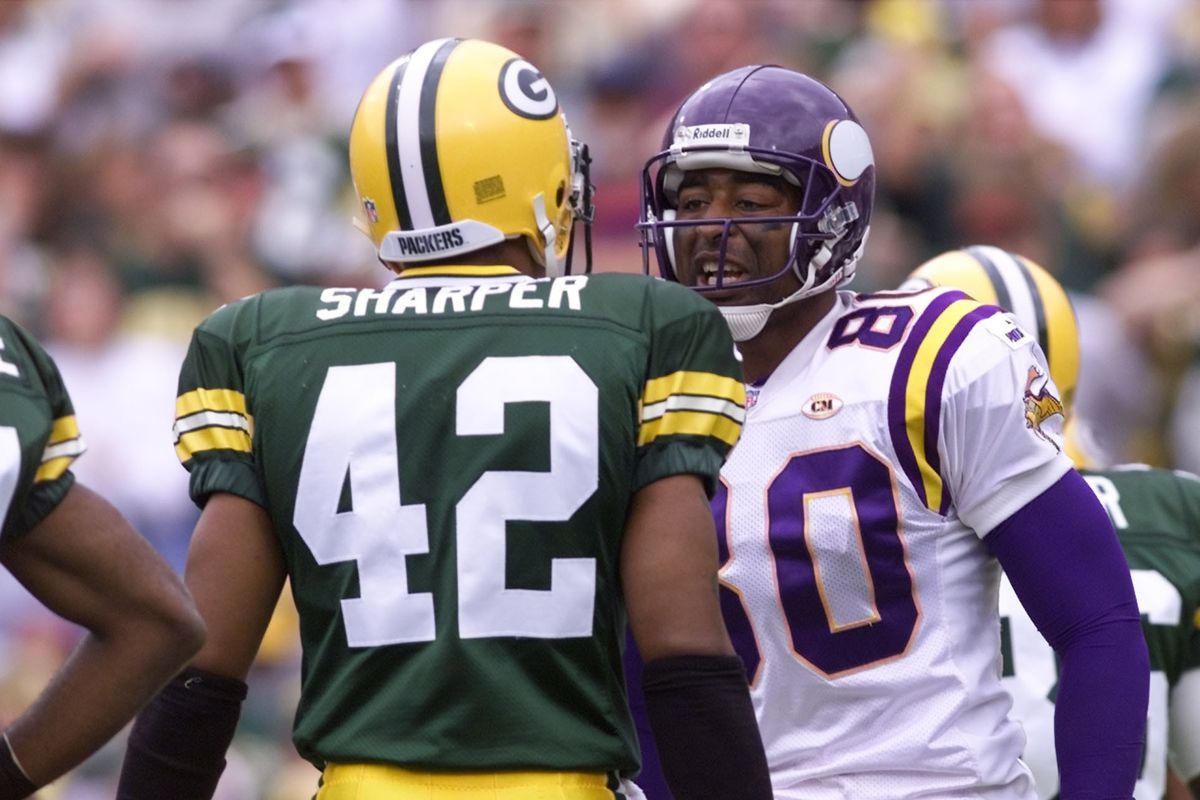 Minnesota Vikings vs green Bay Packers Sept. 26, 1999 — Chris Carter, 80, Faces-off with Green Bay defensive back, Darren Sharper, 42, in the endzone during first quarter action at Lambeau Field. Sharper was called for pass interferance against Carter.