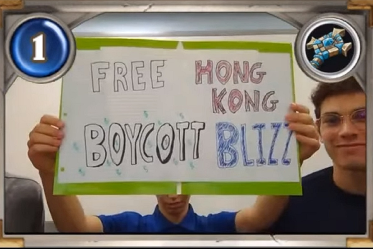 American University Hearthstone players holding a sign that reads “Free Hong Kong, Boycott Blizz”