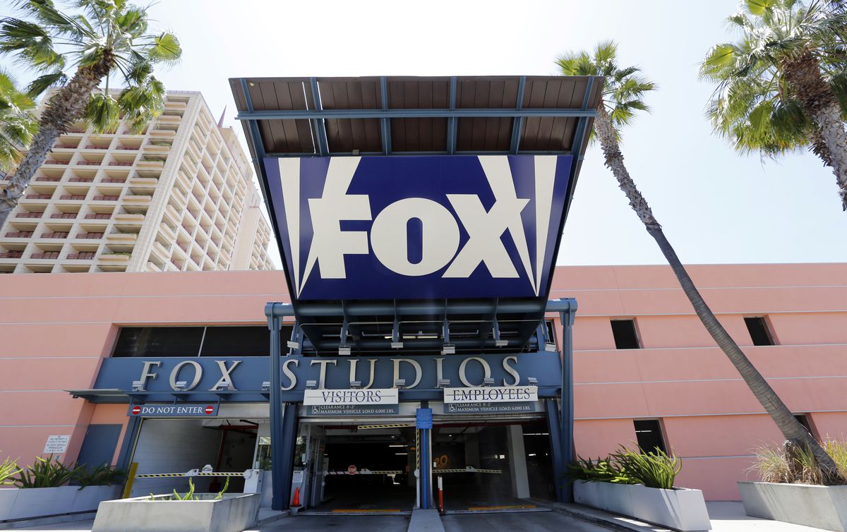 FILE - In this Tuesday, May 7, 2013, file photo, an entrance to a parking garage at 20th Century-Fox studios, an entity owned by News Corporation, is seen in Los Angeles. Disney announced Thursday, Dec. 14, 2017, that it is buying a large part of Fox, but