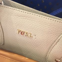 "Furl" purse, $139 (was $348)