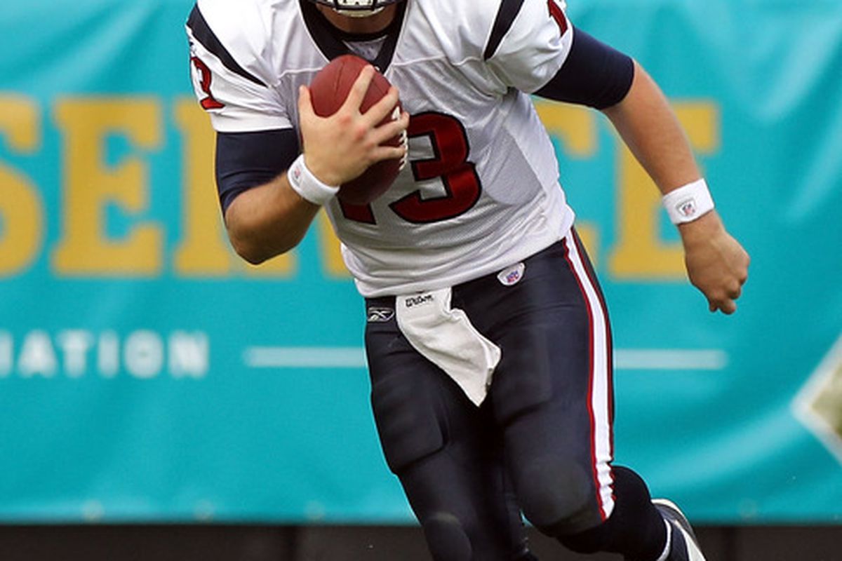 JACKSONVILLE, FL - NOVEMBER 27:  T.J Yates #13 of the Houston Texans scrambles for yardage during the game against the Jacksonville Jaguars at EverBank Field on November 27, 2011 in Jacksonville, Florida.  (Photo by Sam Greenwood/Getty Images)