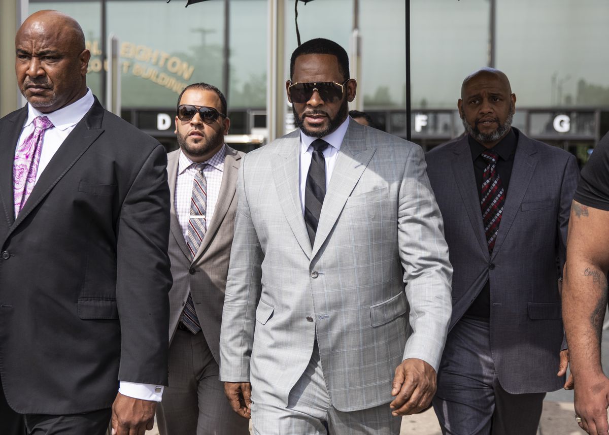 R. Kelly walks out of the Leighton Criminal Courthouse Thursday morning.