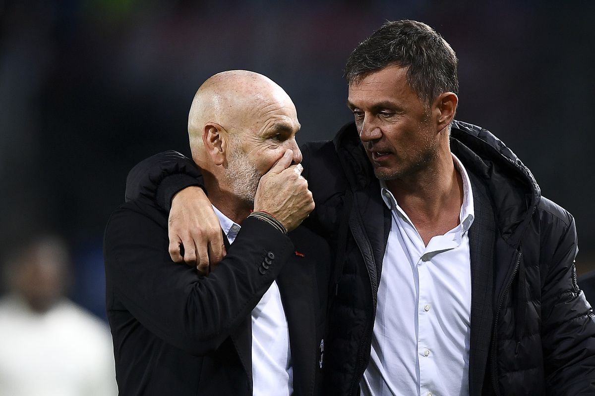 Stefano Pioli (L), head coach of AC Milan, speaks with Paolo...