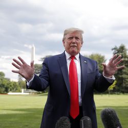 President Donald Trump speaks to members of the media at the White House in Washington, Wednesday, July 24, 2019, as he departs for a short trip to Andrews Air Force Base, Md., and onto Wheeling, W.Va., for a fundraiser. (AP Photo/Carolyn Kaster)