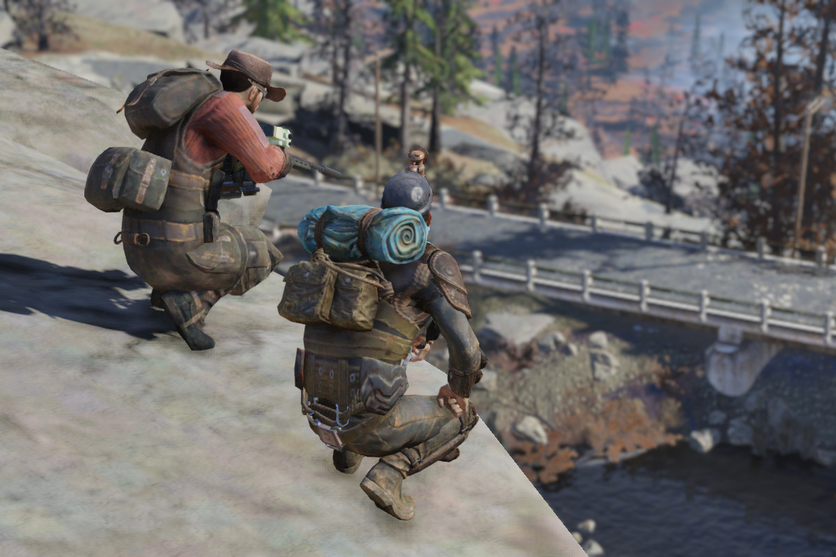 Fallout 76 - two players on a ridge above a bridge