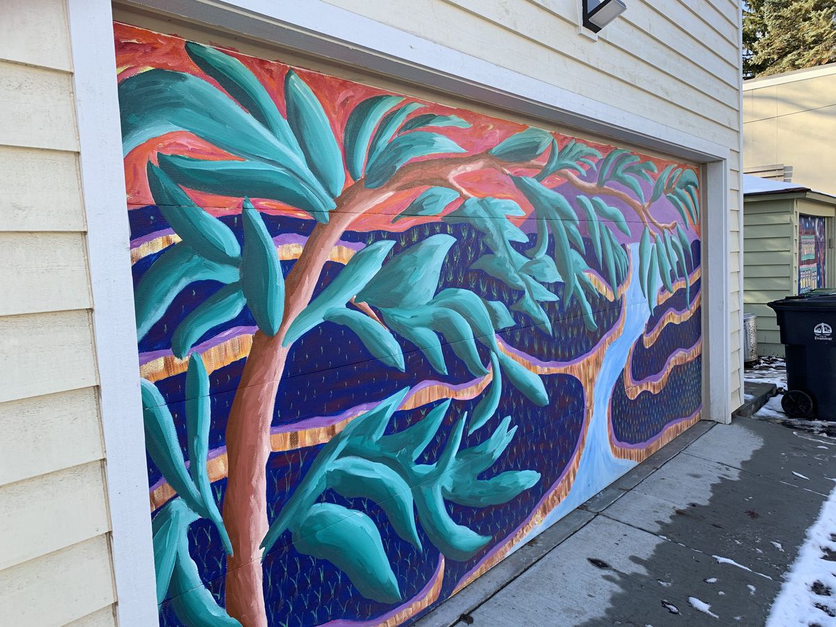 A garage-door mural of Bali, done by Teresa Parod, who studied Indonesian dance for years.
