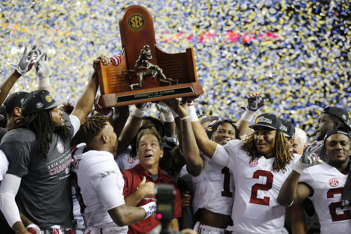 Alabama team members celebrate after the Southeastern Conference championship NCAA college football game against Florida, Saturday, Dec. 3, 2016, in Atlanta. Alabama won 54-16. 