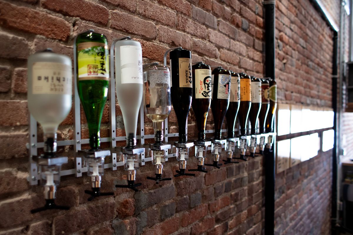 A wall sake dispenser at Ototo in Los Angeles, California.