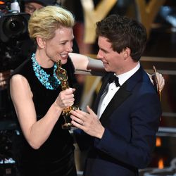 Cate Blanchett, left, presents Eddie Redmayne with the award for best actor in a leading role for “The Theory of Everything” at the Oscars on Sunday, Feb. 22, 2015, at the Dolby Theatre in Los Angeles. 
