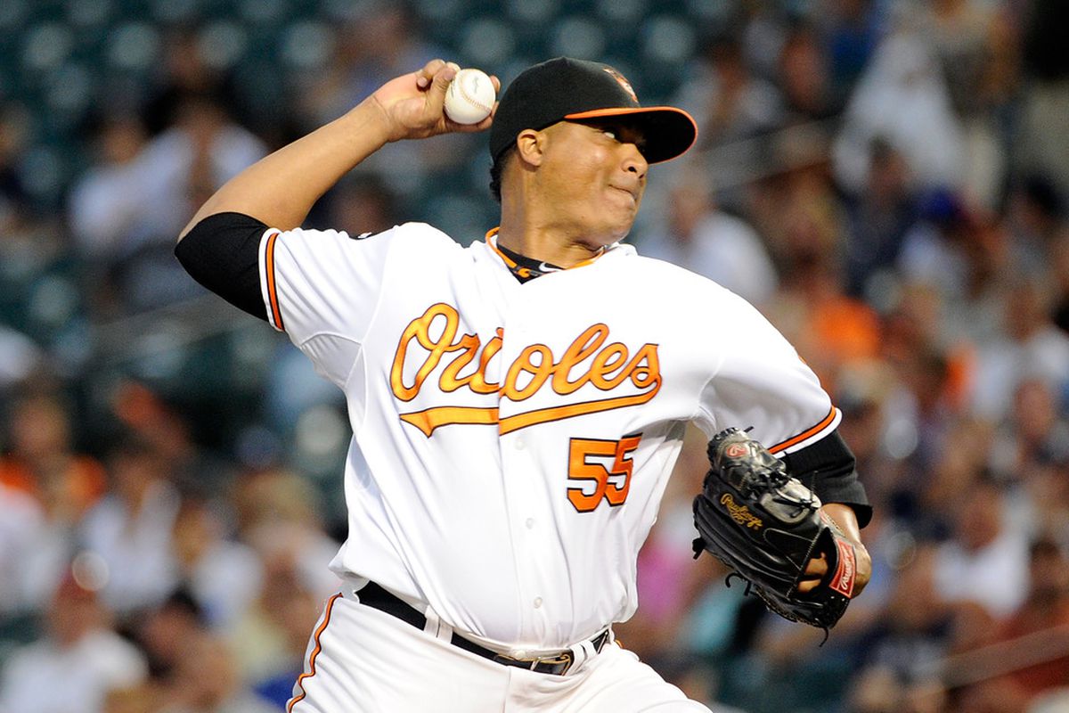 BALTIMORE, MD - AUGUST 29:  Alfredo Simon #55 of the Baltimore Orioles pitches against the New York Yankees at Oriole Park at Camden Yards on August 29, 2011 in Baltimore, Maryland.  (Photo by Greg Fiume/Getty Images)