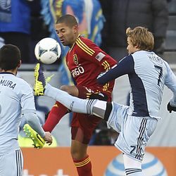 Real's Alvaro Saborio and Kansas City's Chance Myers work to control the ball as Real Salt Lake and Sporting KC play Saturday, Dec. 7, 2013 in MLS Cup action.